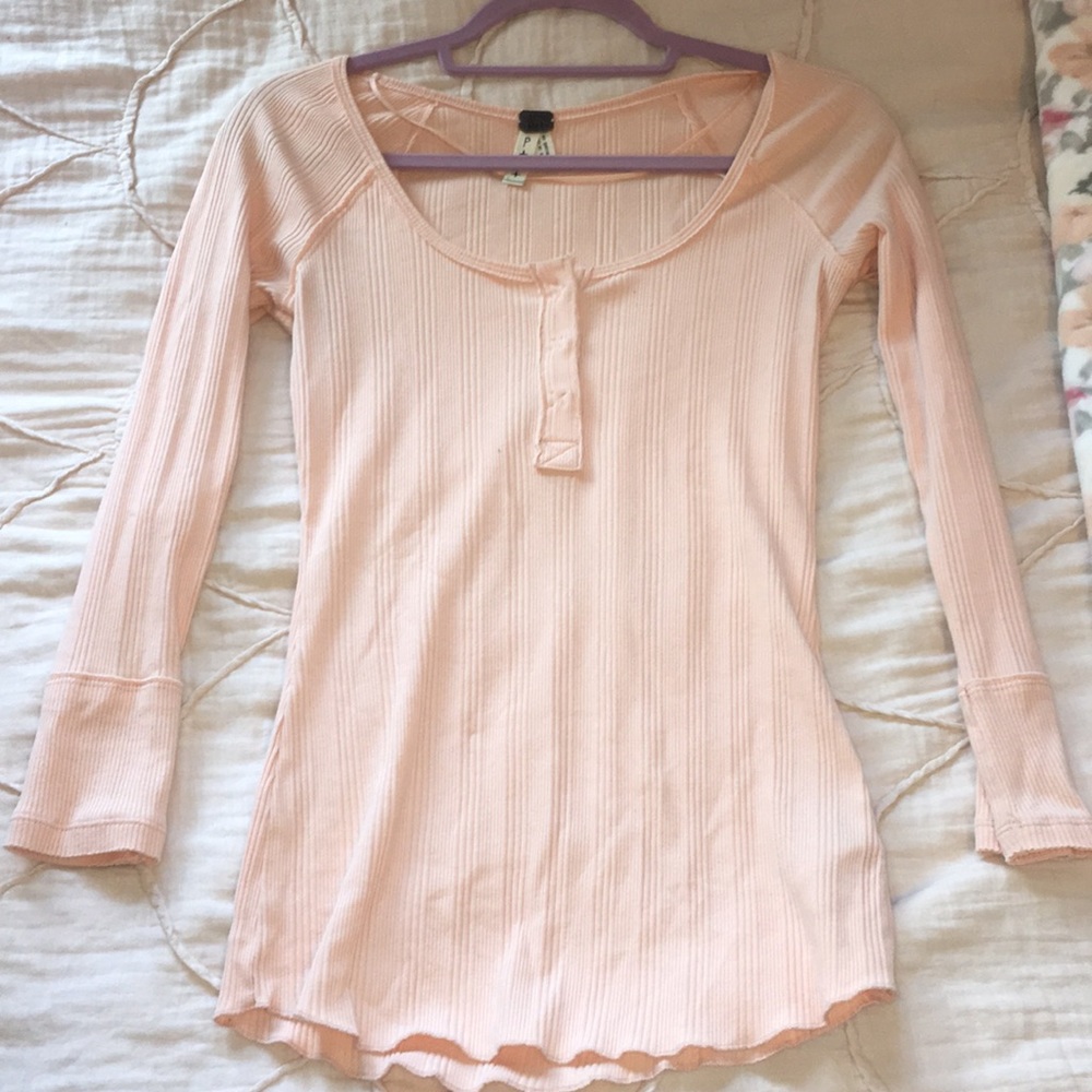 Long sleeve peach colored top